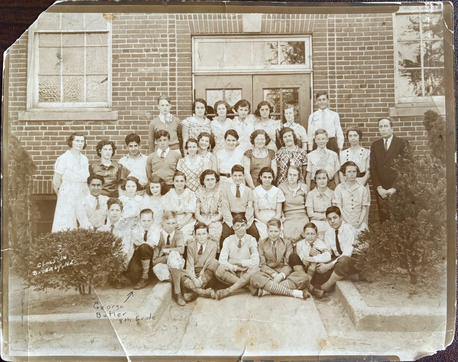 George's grammar-school class — he is marked with an arrow at the front ('George Butler, 8th grade').