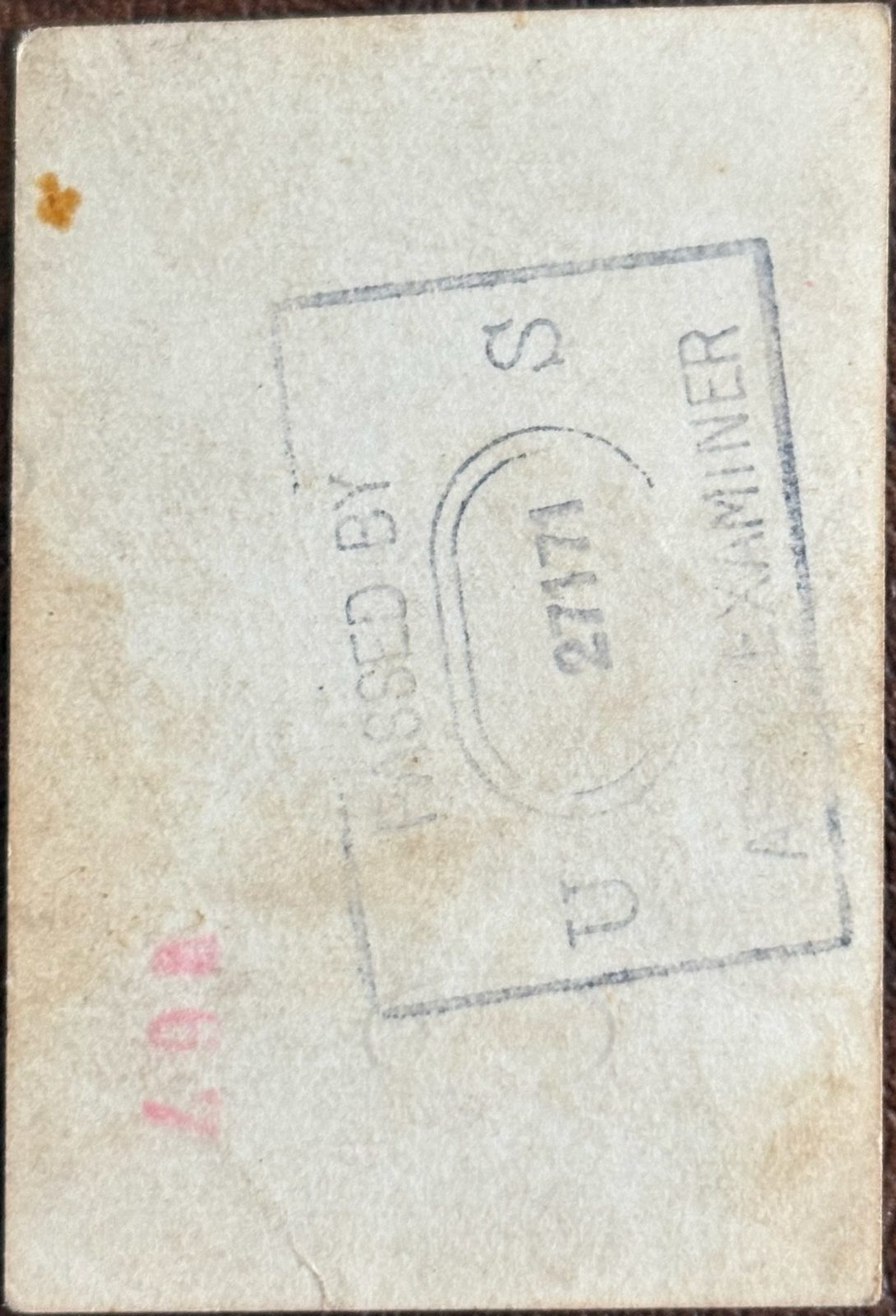 The back of the previous photo — 'PASSED BY U.S. ARMY EXAMINER 27171.' Proof it was mailed home from overseas.
